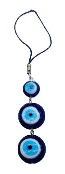 Evil eye charm with blue and white design on a white background